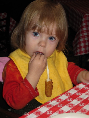 Erika eating a mozzarella stick