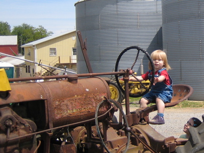 Erika on an old tractor