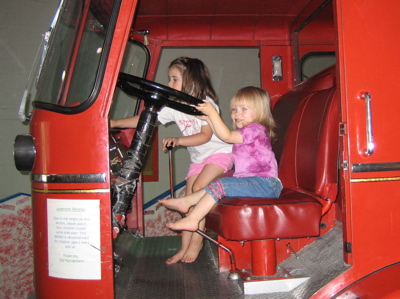 Erika driving a fire truck