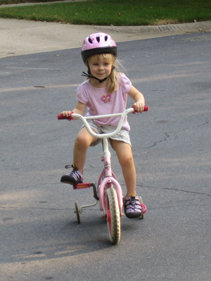 Erika riding her bicycle