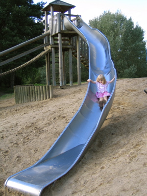 Erika going down a slide