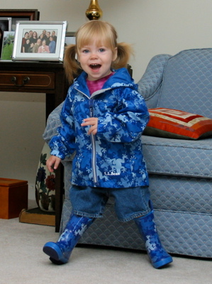 Erika in blue raincoat and boots