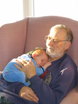 Karl lying on Grandpa's chest asleep